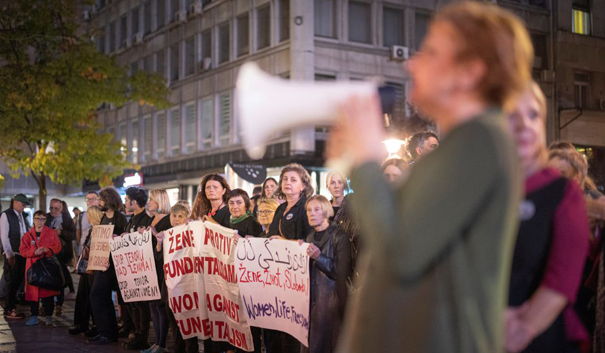 People take part in a protest following the death of Mahsa Amini in Iran